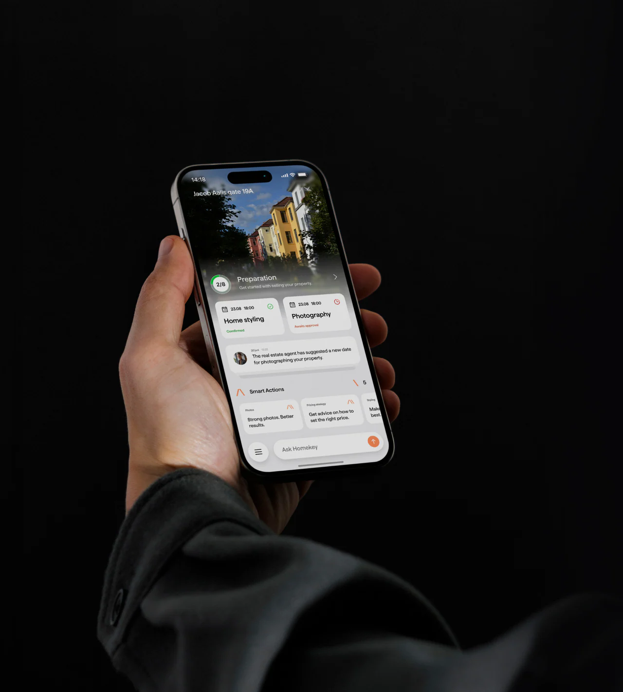 HomeKey app for home buyers on a phone in hand