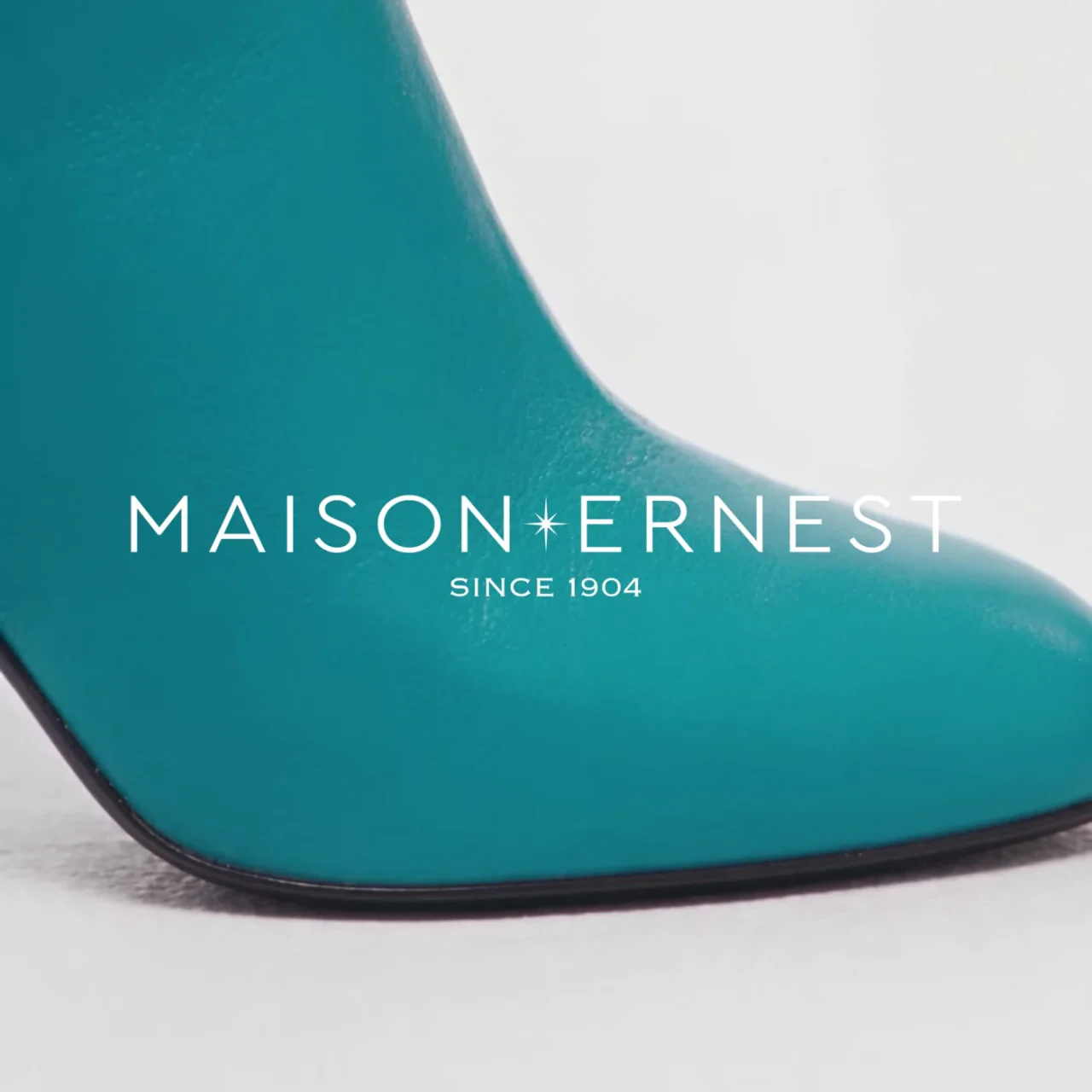 Maison Ernest Allure handbag and Opera boots styled together in a fashion film.