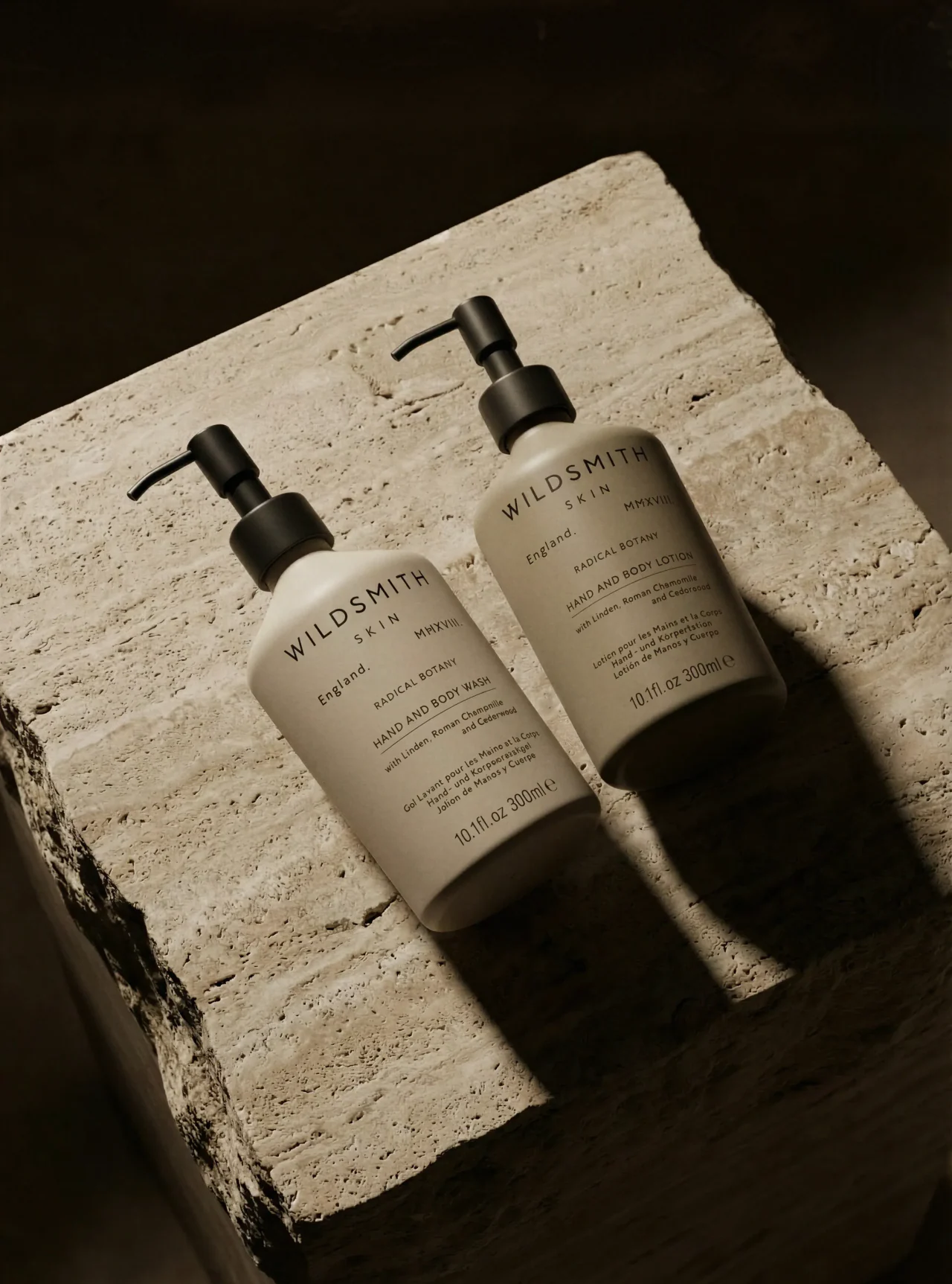 AI product image: body-wash bottles on travertine